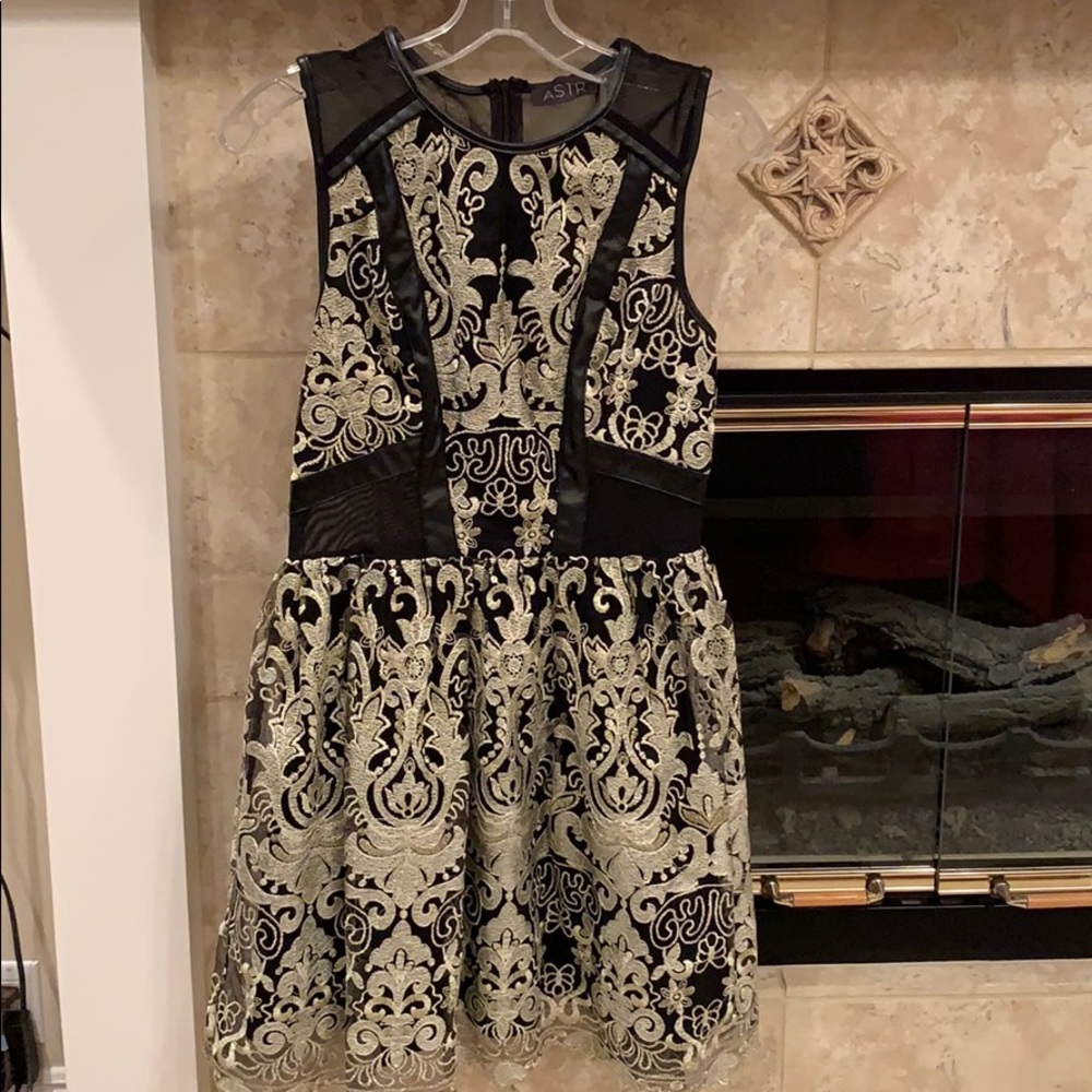 Black dress with champagne detailing